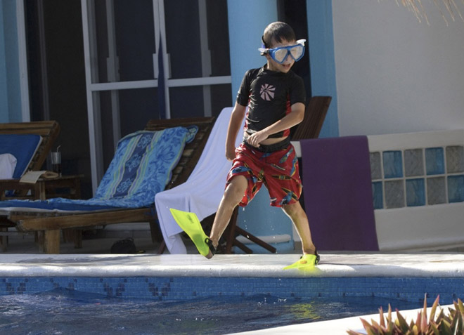 kid at swimming pool